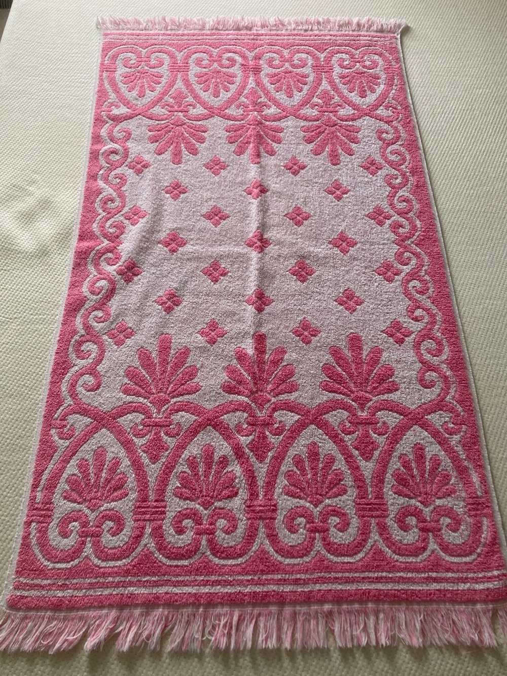 Pink and white vintage Cannon towel with fringe